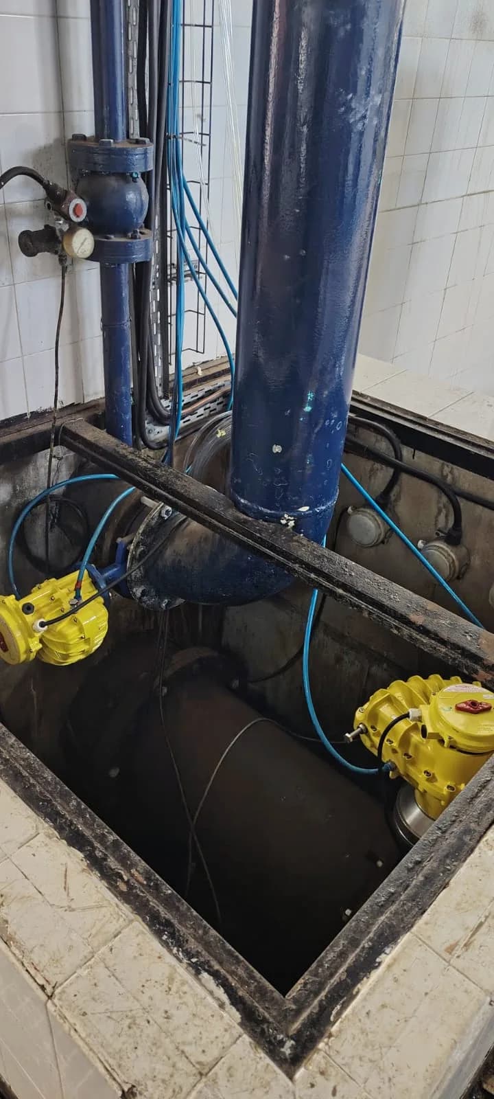 Two pneumatic actuators commissioned on valves beneath the navy rising main